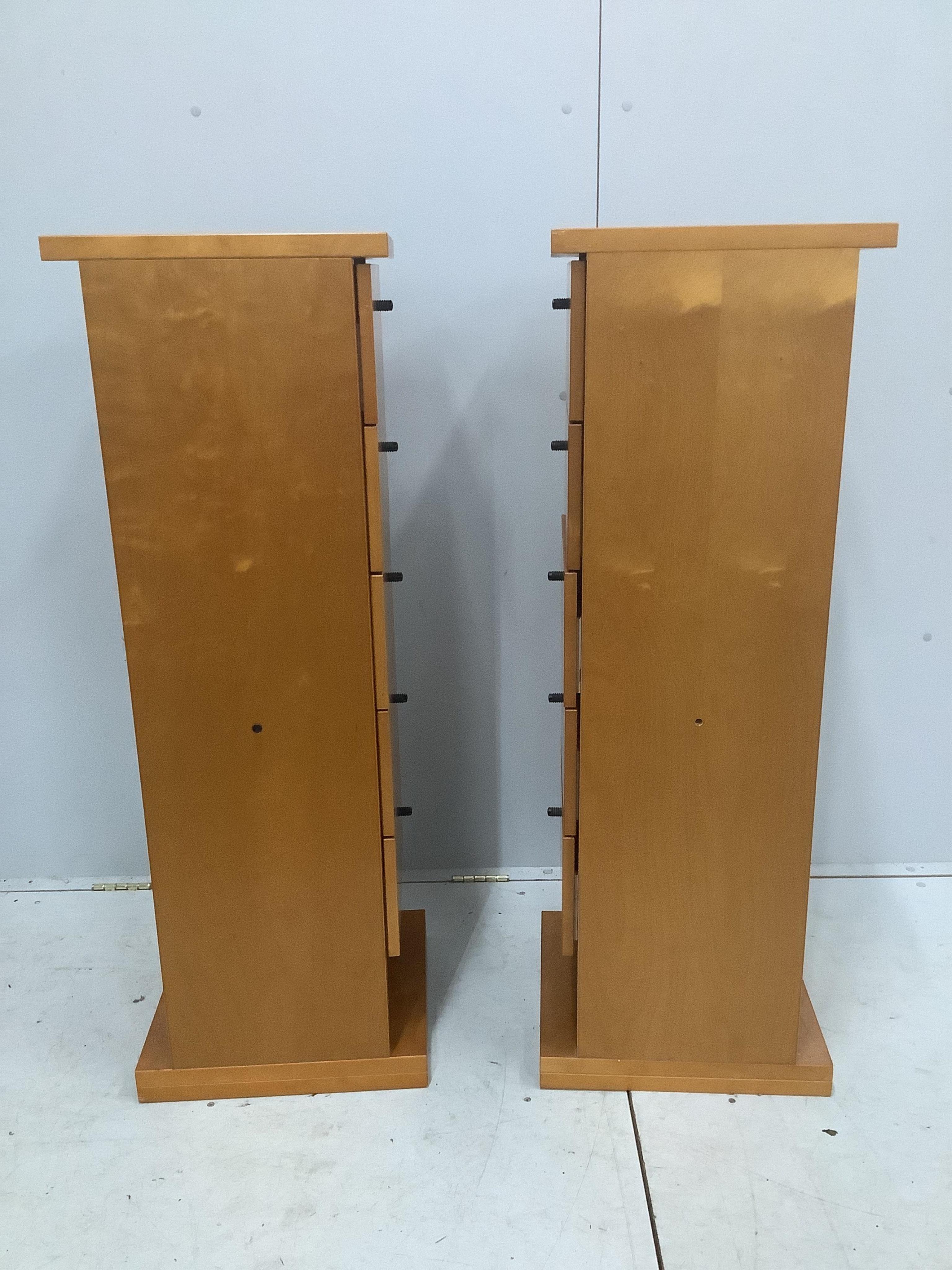 A pair of contemporary Finnish birch five drawer tall chests, width 38cm, depth 38cm, height 115cm. Condition - fair